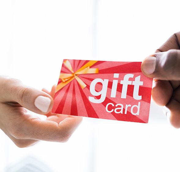 Handing a giftcard to someone